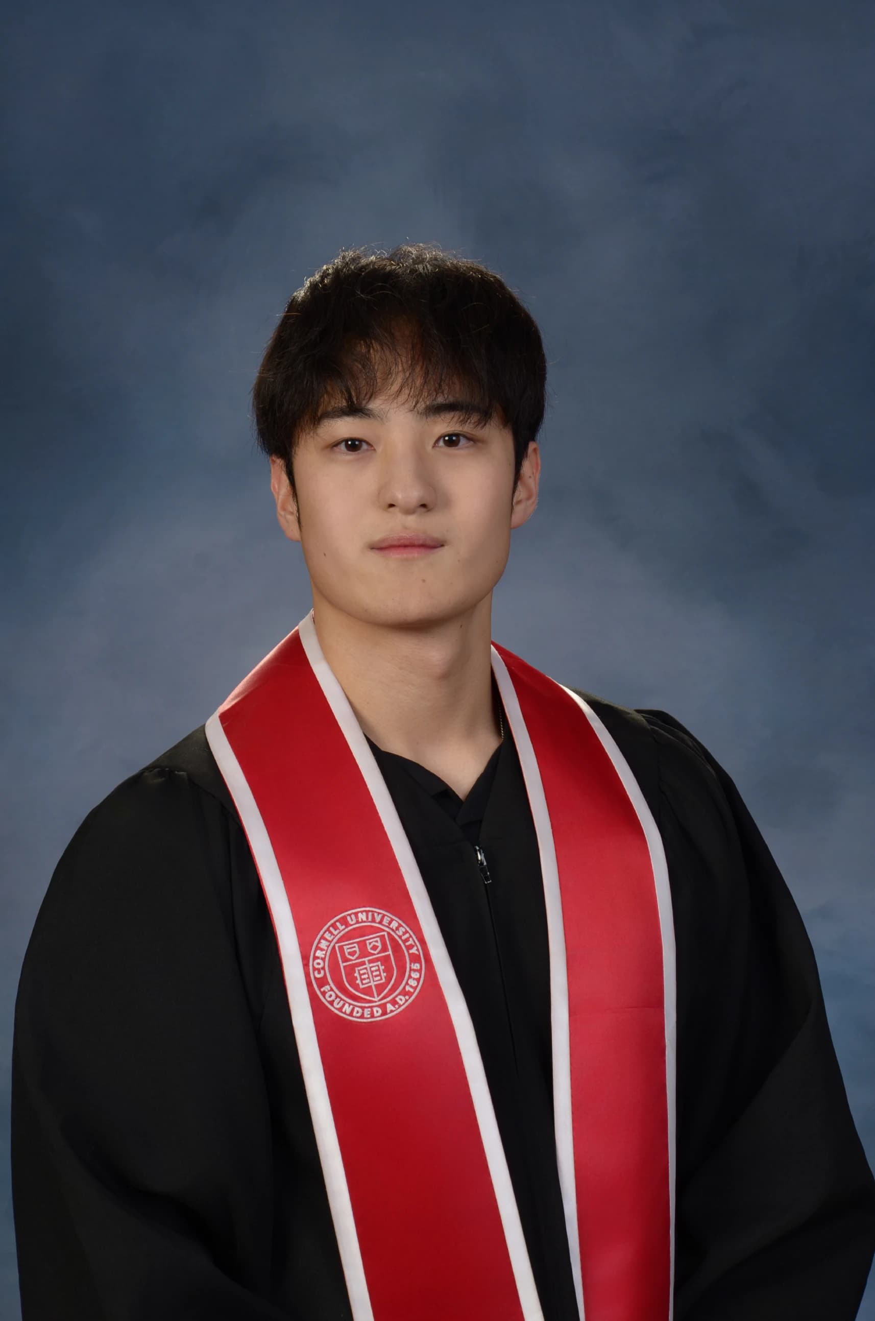 Jason Mun with Cornell sash